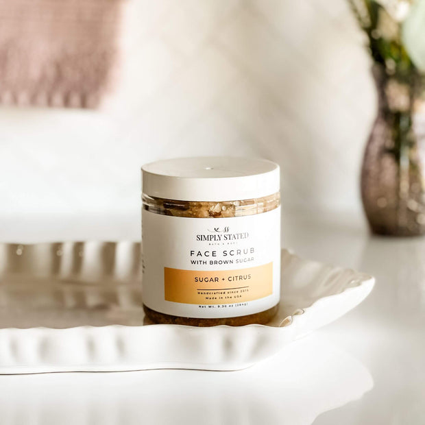 Simply Stated Bath & Body Face Scrub – Zit Zapper exfoliating sugar scrub in an 8oz jar. Sugar + Citrus formula with brown sugar, coconut oil, and essential oils for smooth, radiant skin.