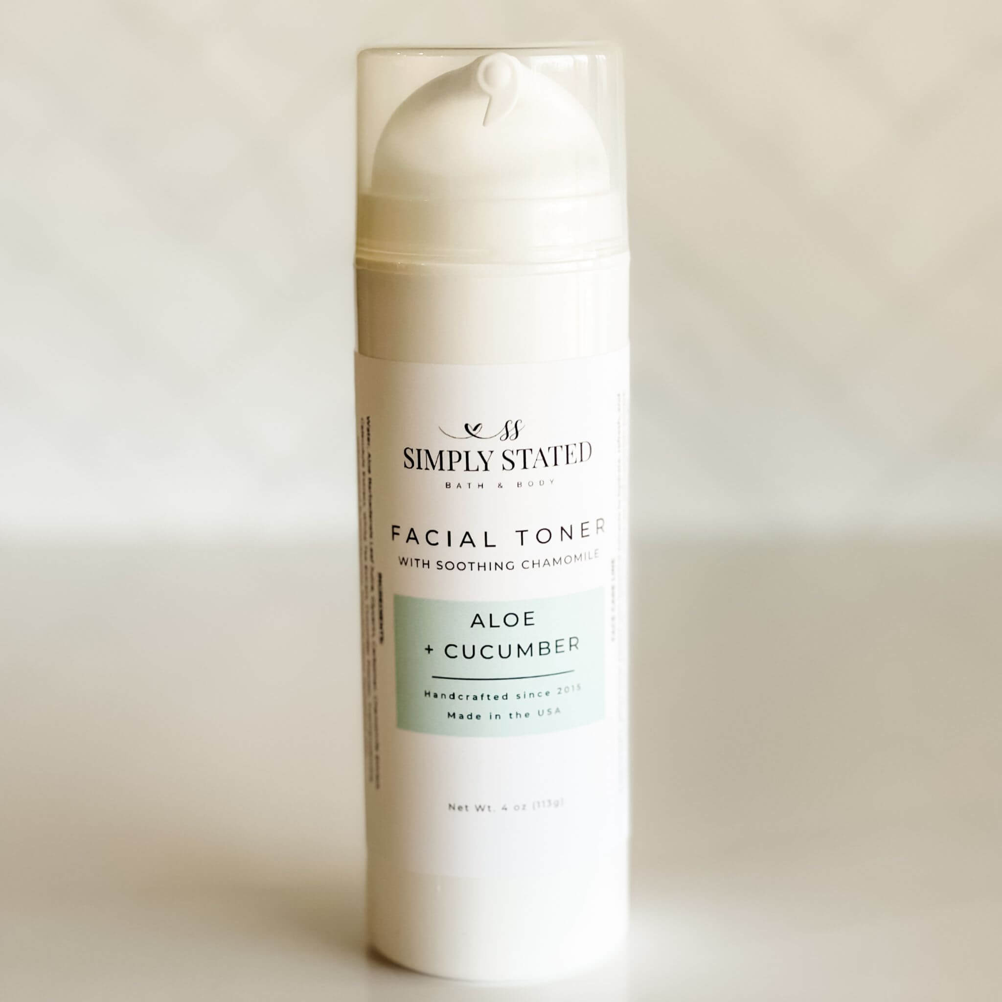 Simply Stated Facial Toner in Aloe + Cucumber, 4oz airless pump bottle, soothing botanical hydration for all skin types.