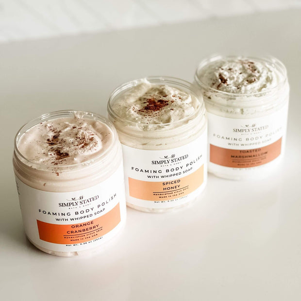 Open jars of Simply Stated Fall Foaming Body Polish with seasonal exfoliating texture