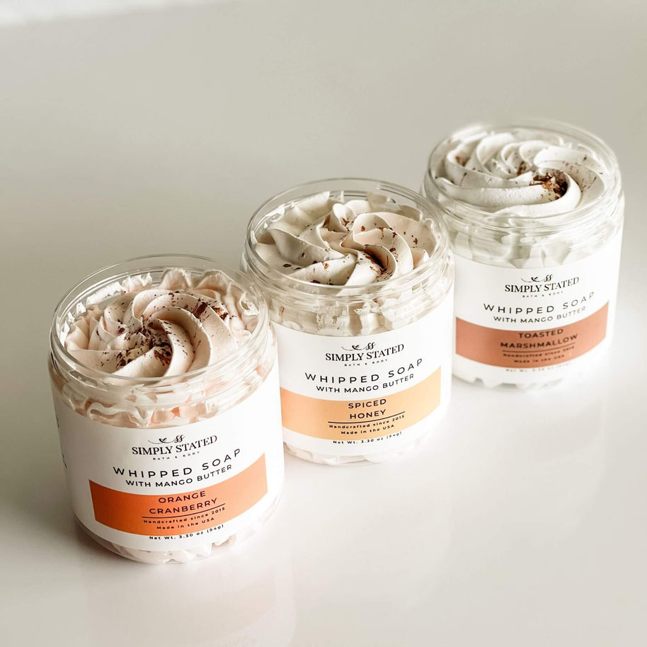 Overhead view of Simply Stated Fall Whipped Soaps in Orange Cranberry, Spiced Honey, and Toasted Marshmallow