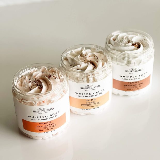 Overhead view of Simply Stated Fall Whipped Soaps in Orange Cranberry, Spiced Honey, and Toasted Marshmallow