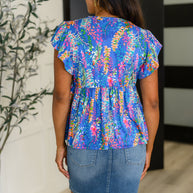 Flirt Alert Flutter Sleeve Top in Blue