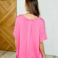In the Rotation Exposed Seam Tee in Hot Pink
