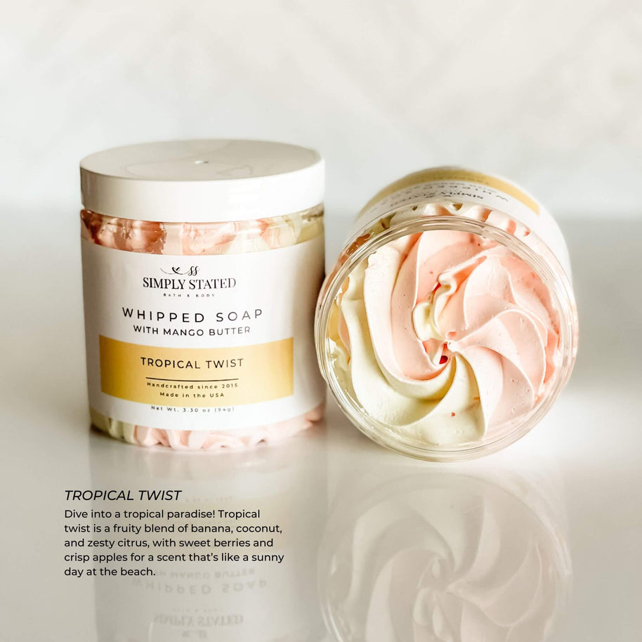 Simply Stated Bath & Body Tropical Twist Whipped Soap for kids. A bright swirl of pink and yellow with a fruity blend of banana, coconut, and zesty citrus for a tropical bath time escape. Made with mango butter for gentle cleansing.