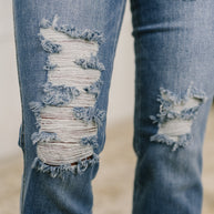 Maureen High Rise Distressed Bootcut Jeans