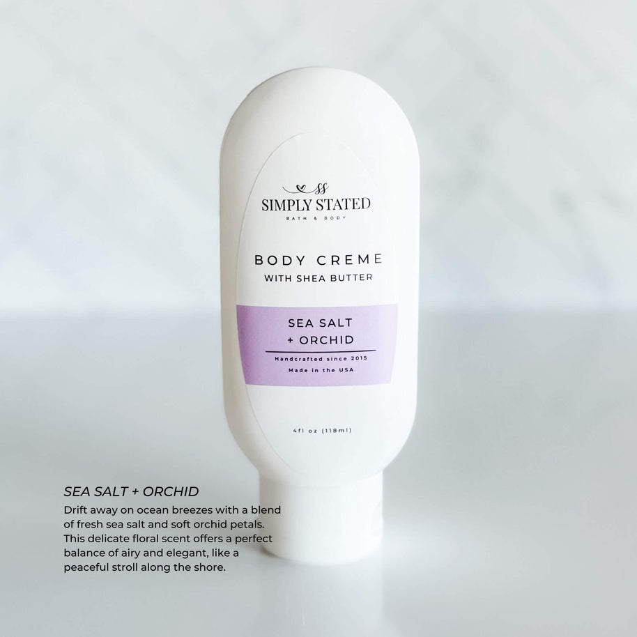 Simply Stated Body Creme in Sea Salt + Orchid scent. A 4oz squeeze bottle with shea butter, offering a delicate floral fragrance of fresh sea salt and orchid petals. Ideal for refreshing, lightweight hydration.