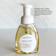 Oatmeal Milk + Honey Signature Hand Soap by Simply Stated Bath & Body, displayed in an 8oz foaming pump bottle. A classic blend of vanilla, oats, and honey for a soothing hand-cleansing experience.