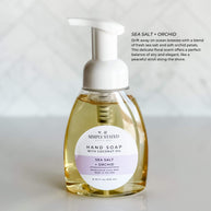 Sea Salt + Orchid Signature Hand Soap from Simply Stated Bath & Body, presented in an 8oz pump bottle. This elegant floral and ocean-inspired scent creates a refreshing cleansing ritual.
