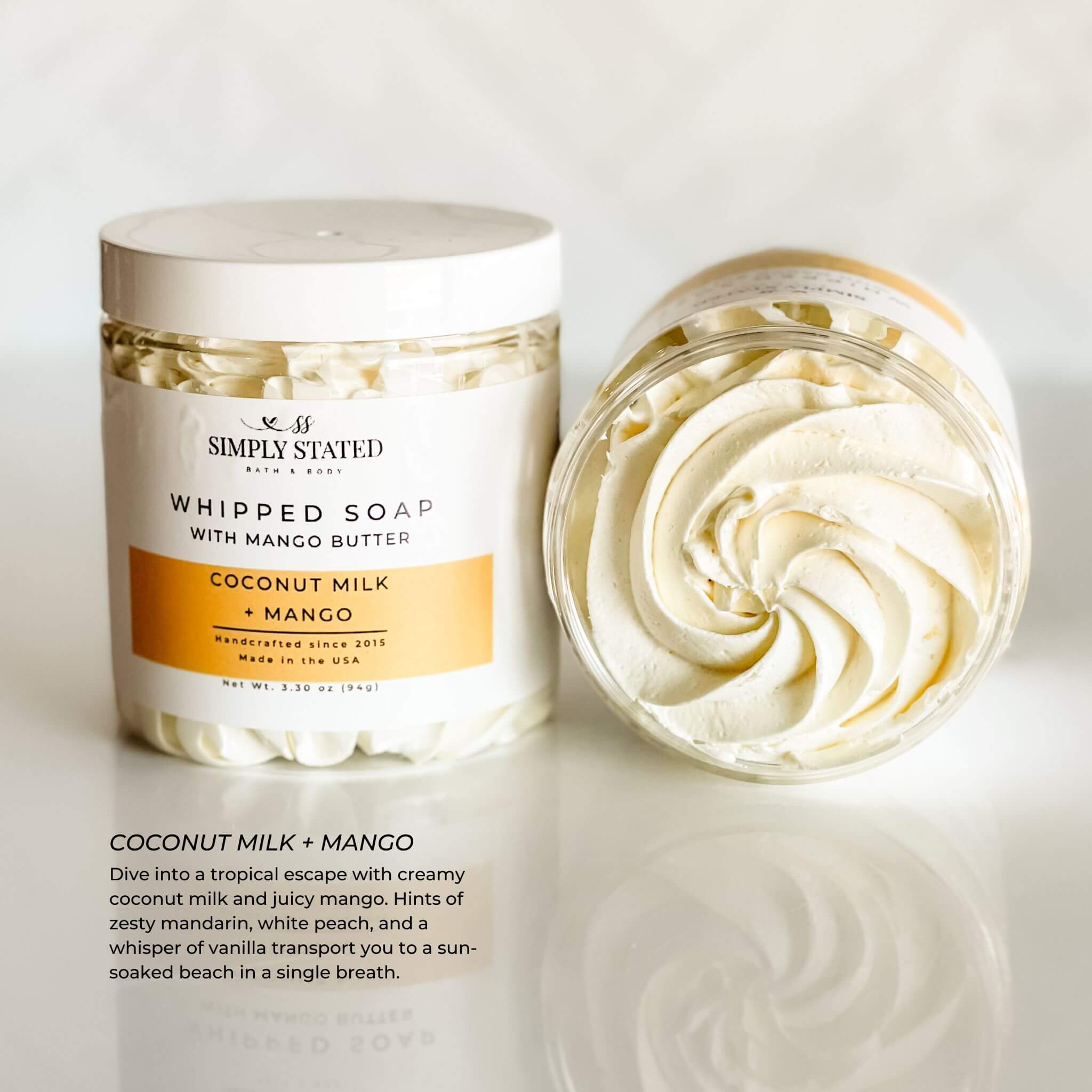 Signature Line Whipped Soap Coconut Milk + Mango, 8oz jar, featuring a tropical whipped soap with creamy coconut milk and juicy mango, handcrafted with mango butter for luxurious lather and hydration.