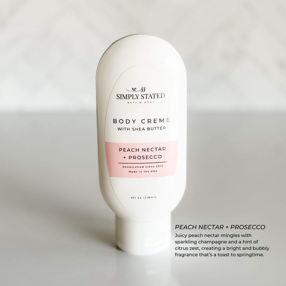 Simply Stated Peach Nectar + Prosecco Body Creme, infused with juicy peach and sparkling champagne notes for a fresh spring scent.