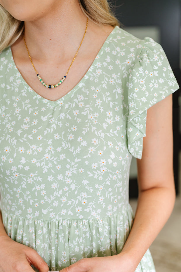 Twirl Me Softly Flutter Sleeve Dress in Sage